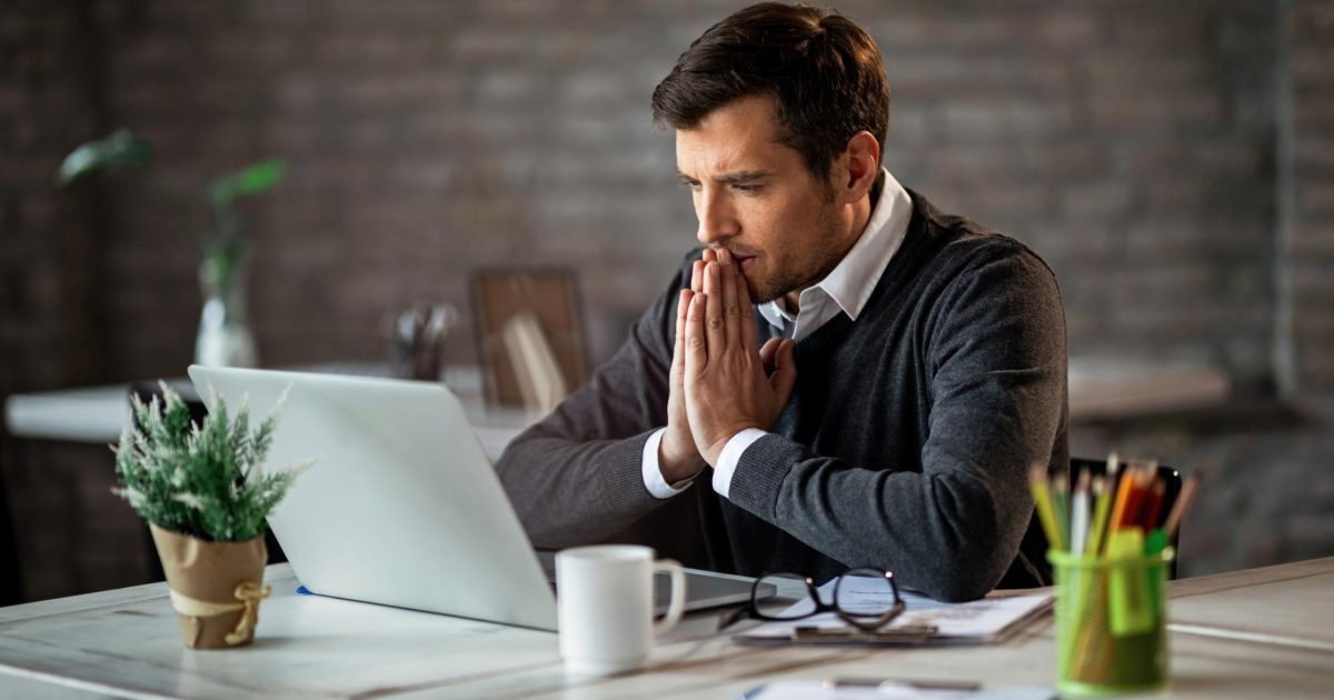 Pensive businessman working in the office Pensive businessman working in the office